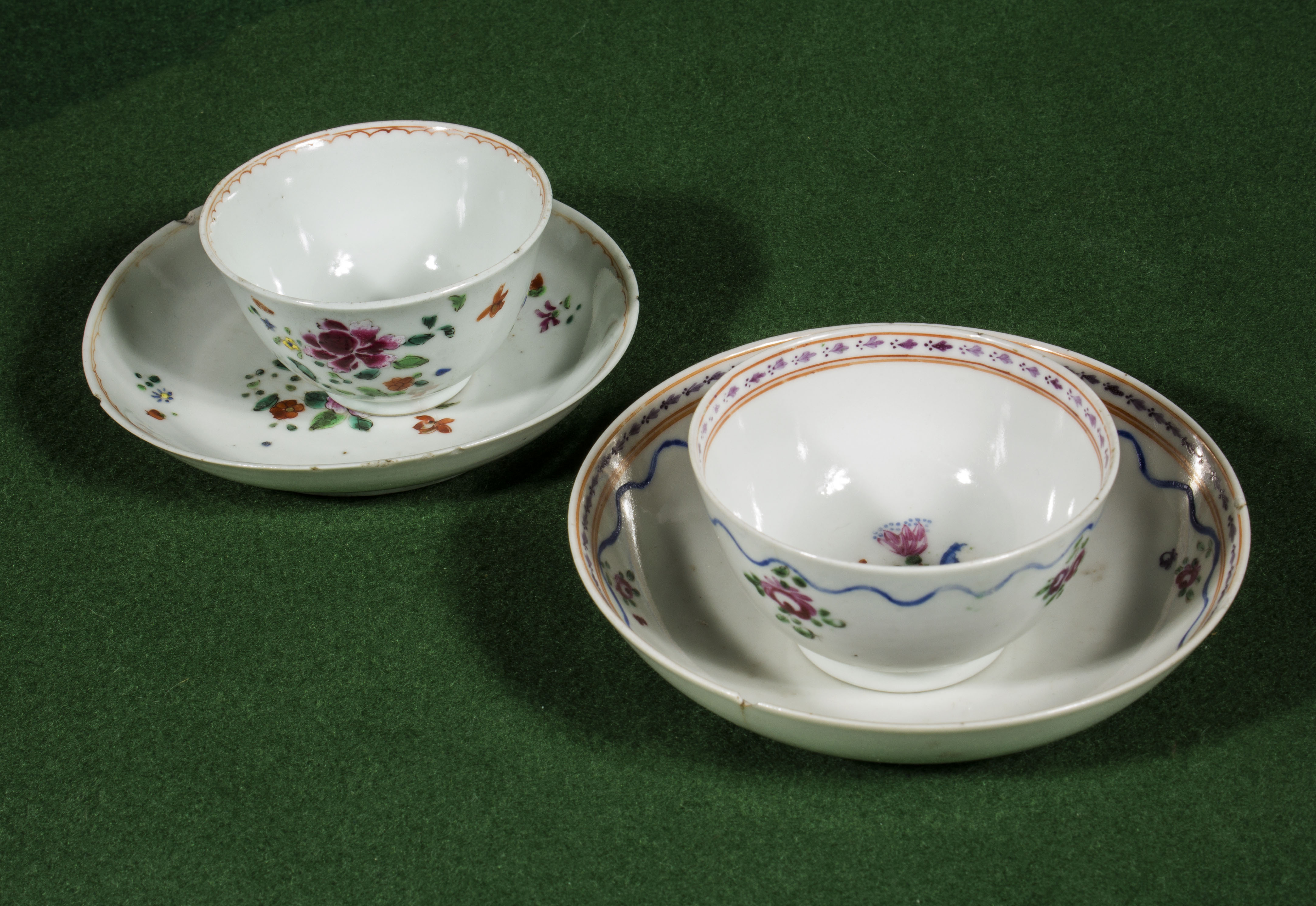 Two 18th century Famille Rose tea bowls and saucers