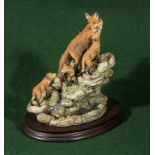 A limited edition Border Fine Arts figure group, 'Moving Home' vixen and fox cubs by David