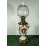 A French Ormolu mounted oil lamp.