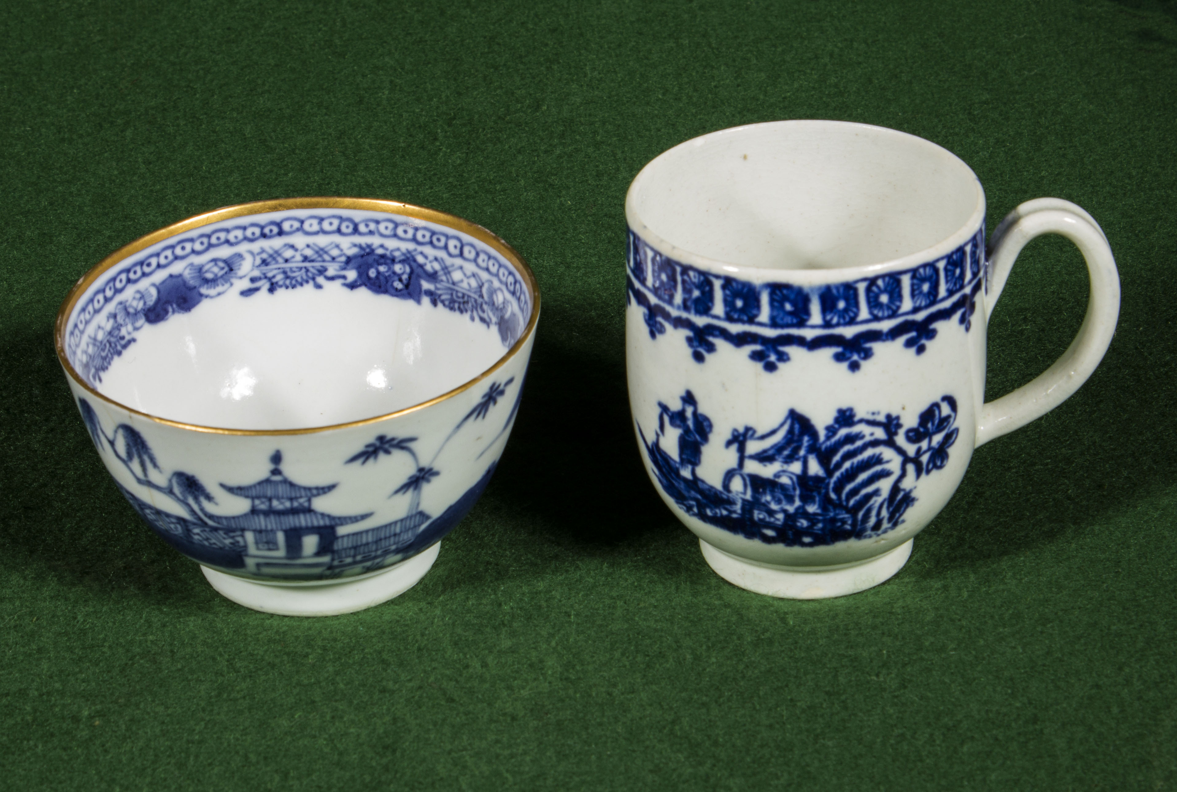 Two blue and white Worcester coffee cups