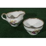 A china cream and sugar bowl