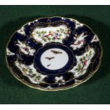 A Royal Worcester plate by G Johnson 'Exotic Birds' 24cm diameter