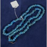 A string of turquoise beads