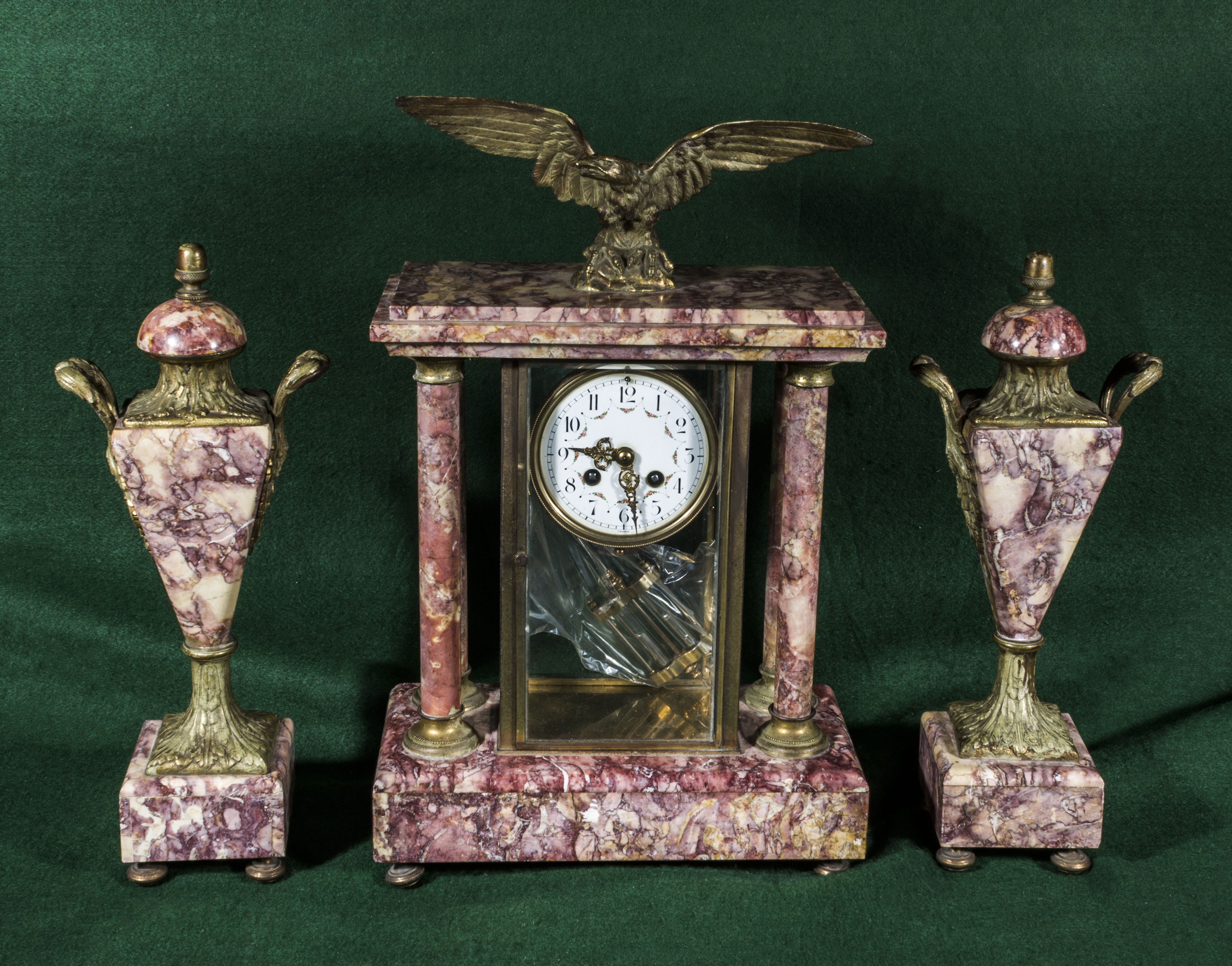 A French pink marble clock garniture