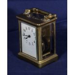 A brass carriage clock.