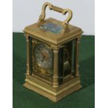 A brass repeater carriage clock