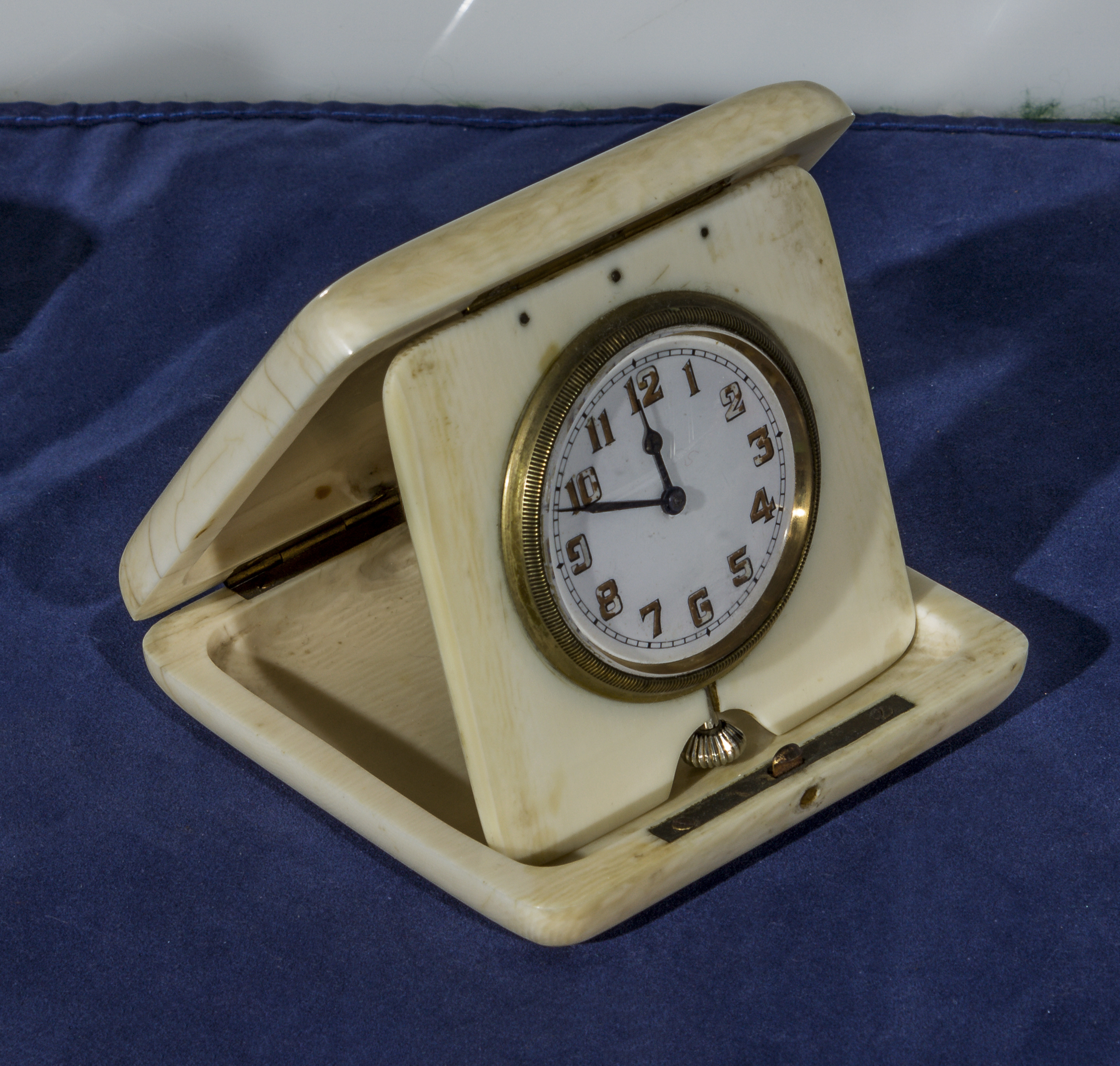 An ivory travel clock