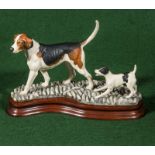 A limited edition Border Fine Arts figure group, 'Old English Foxhound and fox terrier' by Mairi