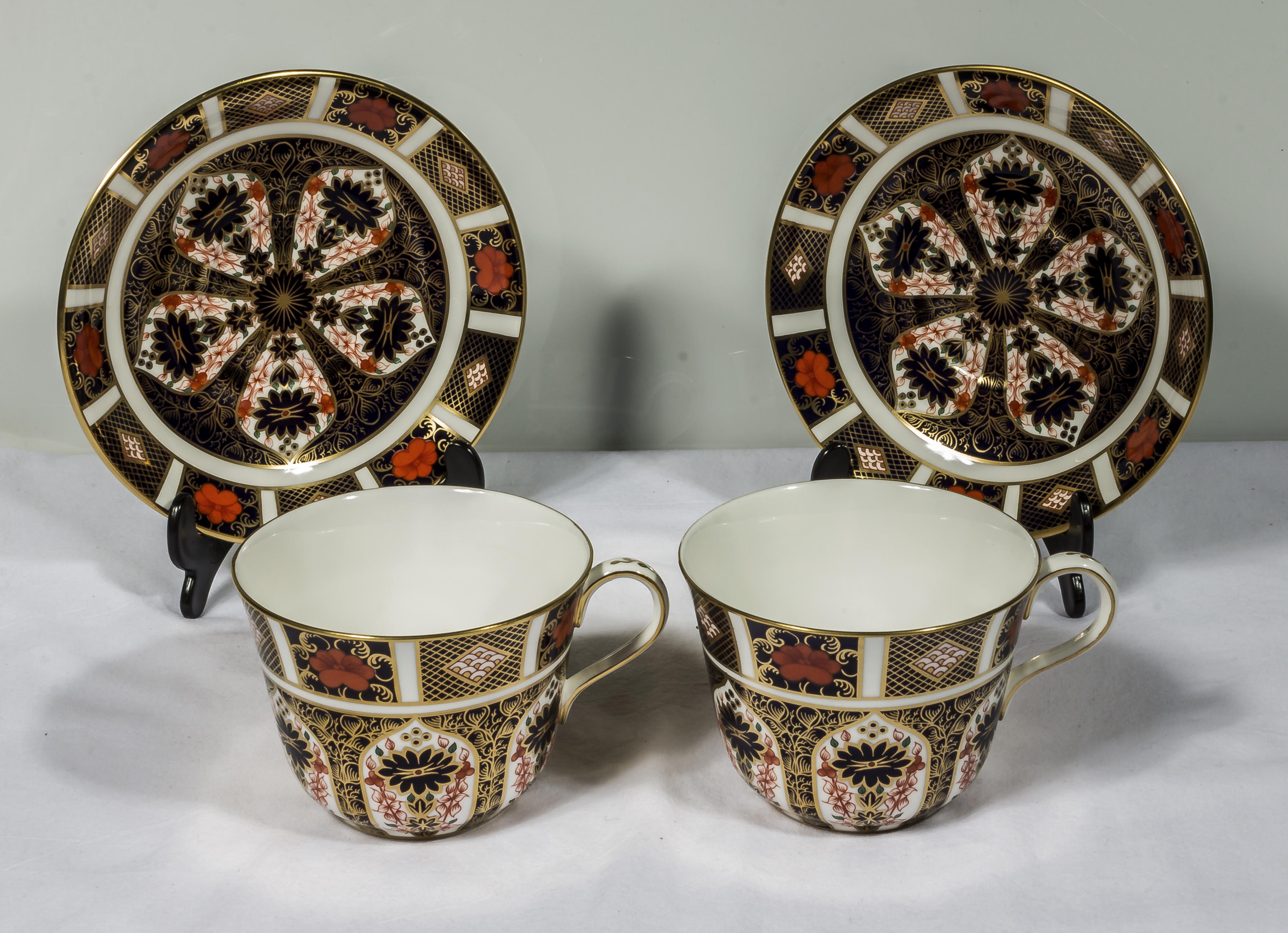 A pair of Royal Crown Derby Old Imari pattern teacups and saucers