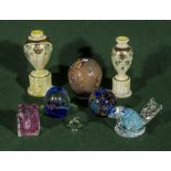 A collection of glass paperweights and other items