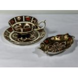 A Royal Crown Derby teacup and saucer together with a pin tray