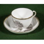 A sepia decorated Worcester teacup and saucer