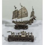 A white metal Chinese junk and a sedan chair on carved wood bases, both signed