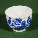 A blue and white Worcester tea bowl of large size decorated with exotic birds in the manner of