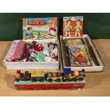 A collection of 1950's toys including a Merit pastry set, dress-up dolls, a box of vintage dolls and