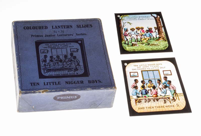 A box containing Primus coloured lantern slides 'Ten Little Nigger Boys' complete set of eight