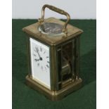 A brass repeater carriage clock