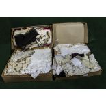 Four boxes of vintage lace, christening gowns and other items