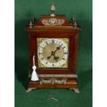 A walnut shelf clock with ormolu