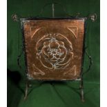 An Arts and Crafts copper fire screen