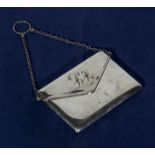 A silver envelope purse