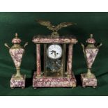 A French pink marble clock garniture