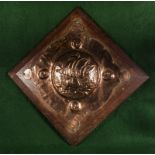 An Arts and Crafts embossed copper wall plaque depicting a Viking ship, in the style of Liberty's