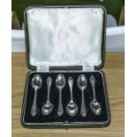 A cased set of silver tea spoons