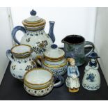 A hand painted tea set, two figures and a jug