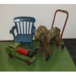 A vintage push along dog, train and a child's chair