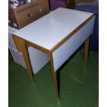 A Formica topped kitchen table