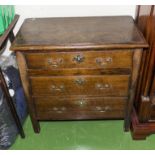 A small oak chest of three drawers