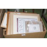 A box containing frames and prints