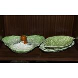 A Beswick Ware cabbage leaf and tomato dish together with a Carlton Ware dish and one other