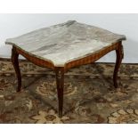 A marble top French table.