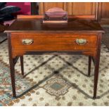 An Edwardian side table.