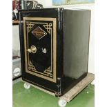 A Victorian safe with key.(lawyers clearance).