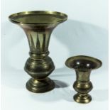 Two Islamic bronze vases, 41cm tall and 20cm