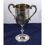 An early Victorian silver cup, 24cm tall and weighs 480gms, marks for London