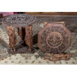 A pair of carved Eastern tables.