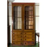 A late Victorian part bookcase (centre part of a breakfront) Pine door glazed cabinet over bank of 8