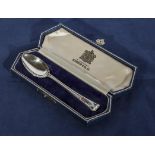 A silver christening spoon in fitted case, marks for Birmingham 1937