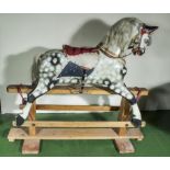 A very large rocking horse .