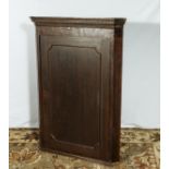 Oak corner cabinet.