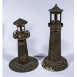 Two metal lighthouses