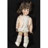 A bisque head doll