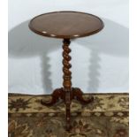 A round occasional table with barley twist support