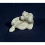 A netsuke modelled as a monkey