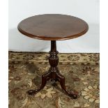 A Victorian mahogany table.