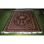 A blue ground Keshan carpet 2.30m x 1.60m